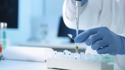 A generic image of a technician working at a laboratory.