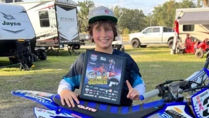 Jesse Brown, 11, white boy, brown hair with hat