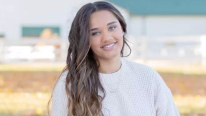 Janae Edmundson, 16, long brown wavy hair, green eyes, smiling