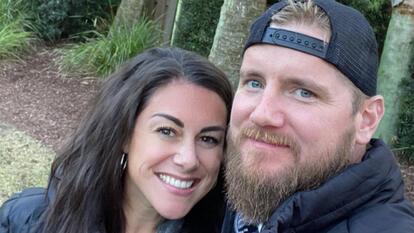 Samantha Miller and Aric Hutchinson smiling for picture