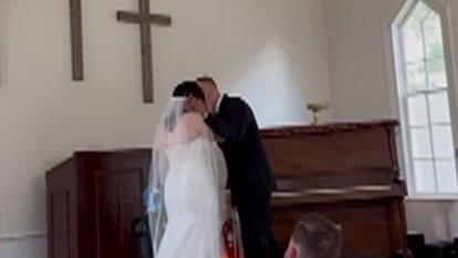 bride and groom kissing