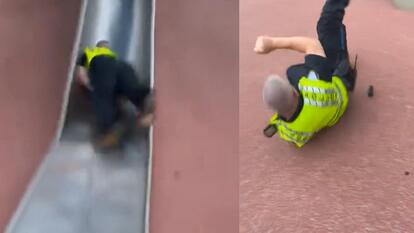 Police Officer Tumbles Down Giant Playground Slide