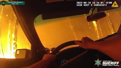 Emotions ran high when a deputy in Washington state drove through a forest fire.