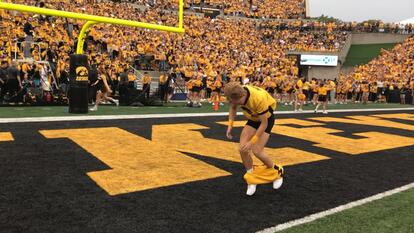 University of Iowa Cheerleader's Pants Fall Down During Backflip