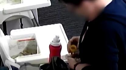 daycare worker powering pills into her hand