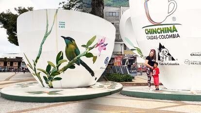 Tourists visiting giant coffee cup in Colombia