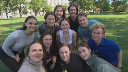 group of siblings huddling for picture