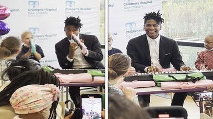 Jon Batiste performs at hospital