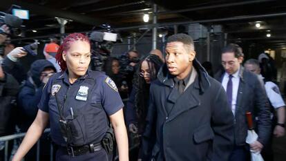 Jonathan Majors leaving court.