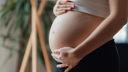 A stock photo of a pregnant woman