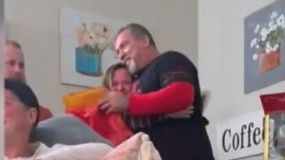 daughter and father hugging