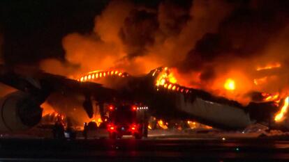 Japan airline in flames.