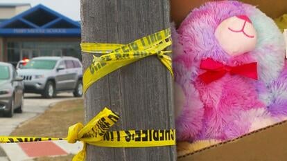Police tape around pole/ Teddy Bear