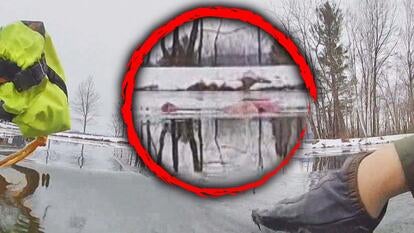 State trooper plunges into freezing water