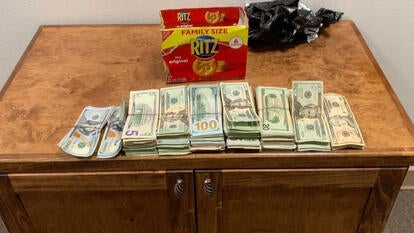 A 'Large Amount' of Cash Found in Ritz Cracker Box, Hidden Under Car: Cops