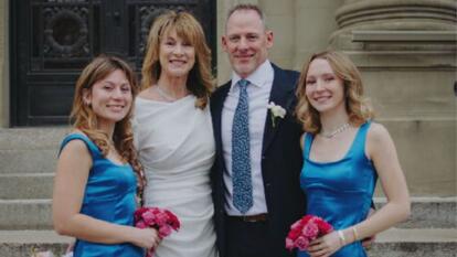 sisters Caroline and Rachel Gaede and their parents Scott and Julie ath Scott and Julie's wedding