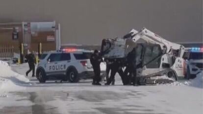 police stopping snow plow driver