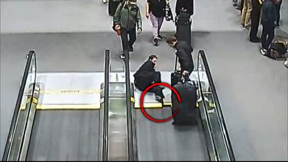 Pilot's Foot Gets Stuck in Moving Walkway at Airport 