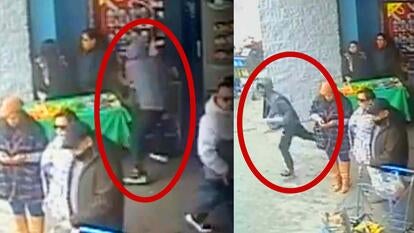 man in red circle stealing money