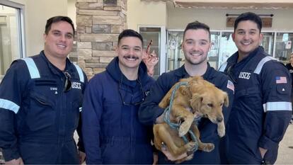 U.S. Coast Guard inspector with Connie the dog