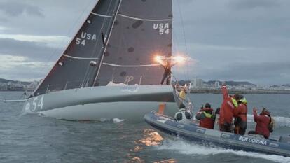 boat sailing with Cole Brauer on it holding flares