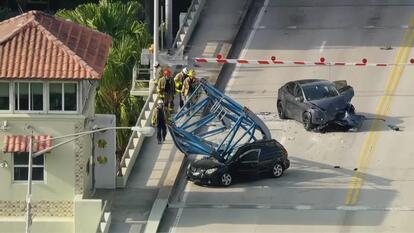 Crane Part Falls on Car 