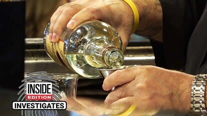 Bartender pours a drink