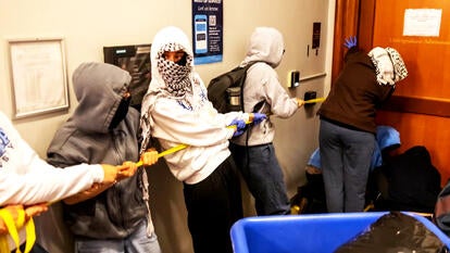 Protesters barricade themselves inside Columbia University