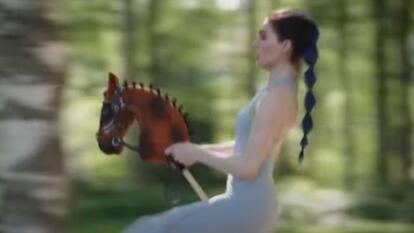 person riding stick horse