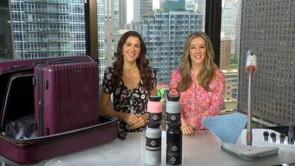 Megan Alexander and MorningSave representative stand behind table arrayed with products