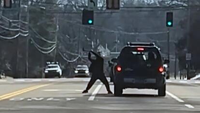 Shocking video shows a Tennessee driver attacking a couple's car with an ax.