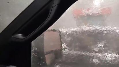 father and son caught in their car in the middle of a tornado