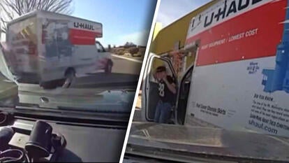 U-Haul truck, Man getting out of U-Haul with hands in the air