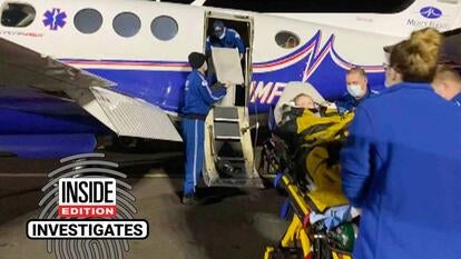 Ambulance bed being loaded into a plane 