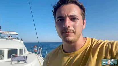 Teen taking a selfie while on a boat in the water