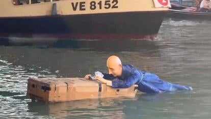 Mannequin of Jeff Bezos on Amazon package floating in water