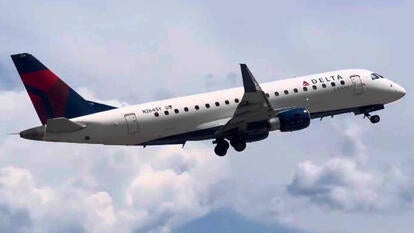 Delta airplane taking off