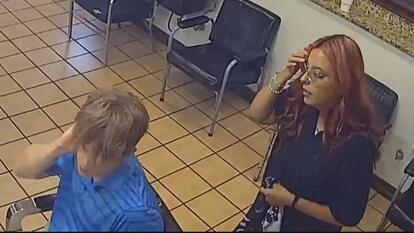 Stylist Adriana Avalos giving murder suspect Andrew McGann haircut just before McGann's arrest
