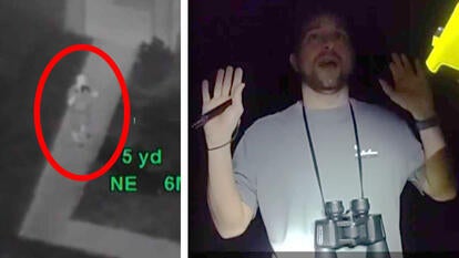 Man on night vision cam, Man wearing binoculars with hands in the air