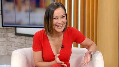 Eva Pilgrim, Inside Edition's new host, smiling in an interview