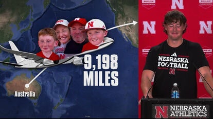 Map showing Australia and the United States, with graphic showing Archie Wilson's family traveling 9,198 miles by plane; Wilson bursting into tears during a press conference in August 2025 