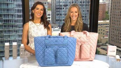 Two women behind a table displaying Haircare Set, Travel Tote, Dermal Brush
