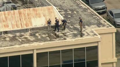 roof in Dallas where gunman opened fire on an ICE van 