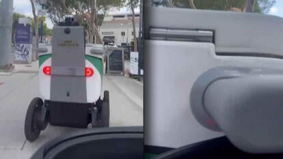 Robot driving in front of a man in a mobility scooter / Impact of robot and mobility scooter