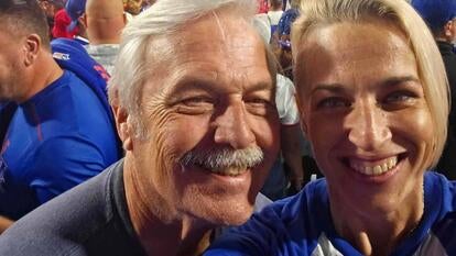 Father and daughter in the crowd at a Buffalo Bill's game