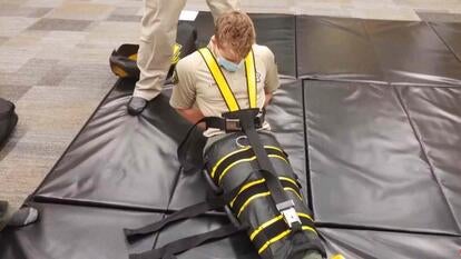 Law enforcement officer restrained during training