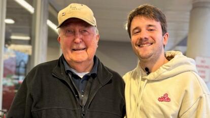 Ed Bambas and Sam Wiedenhoffer smile for the camera