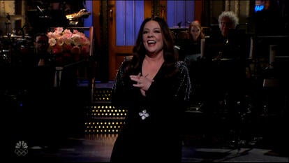 Melissa McCarthy on stage giving monologue at Saturday Night Live