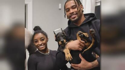 Simone Biles, Jonathan Owens, Doberman Pinscher puppy