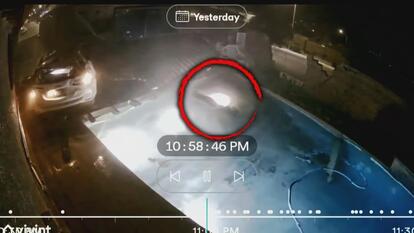 Crashed car next to pool, driver in pool 